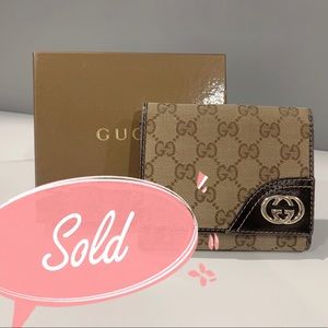 Authentic Gucci GG Marmont canvas/leather trifold wallet